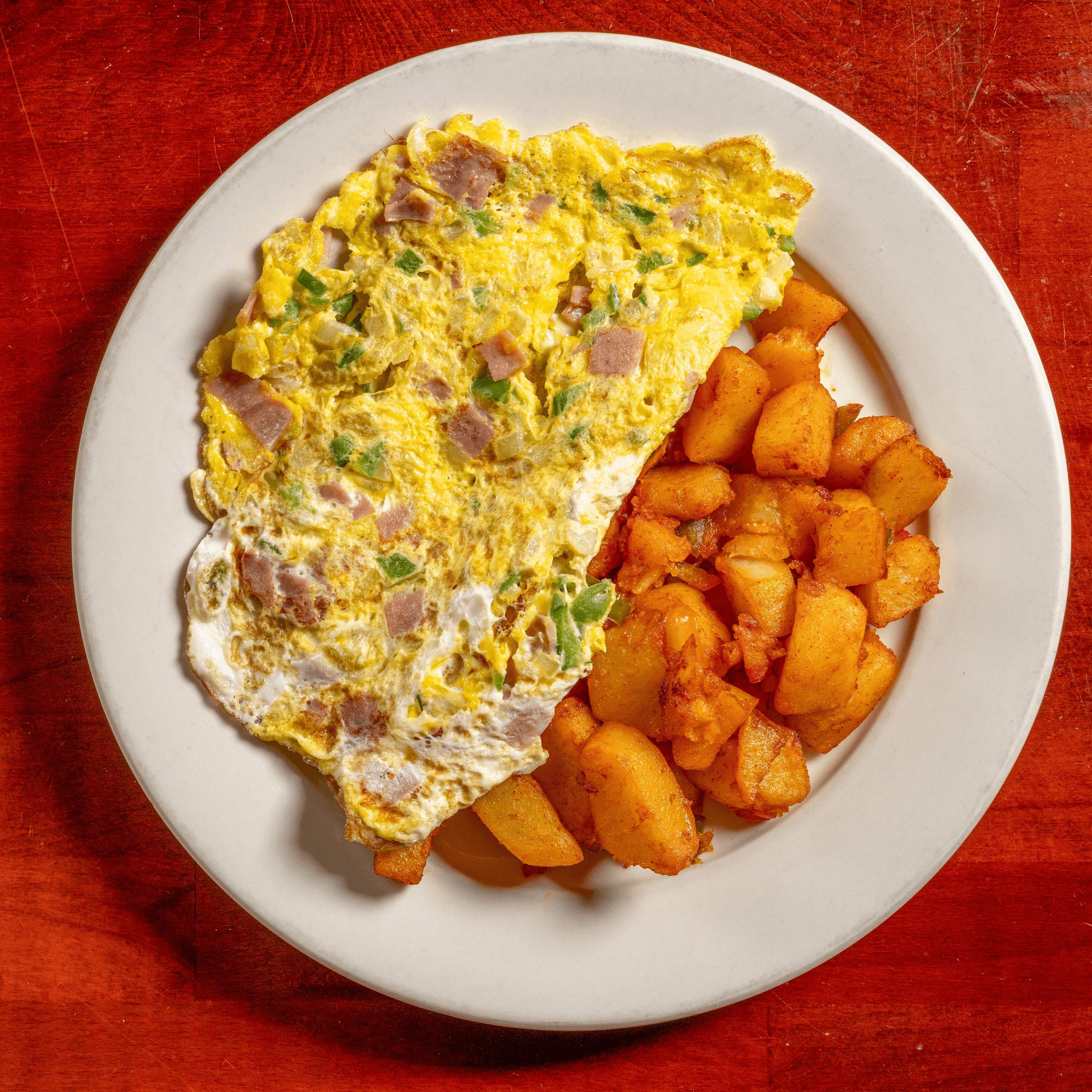 Tortilla Con Pimiento Y Cebolla Combinado 3 Huevos Con Jamón O Chorizo Español O Tocino (Western Omelette 3 Eggs).
