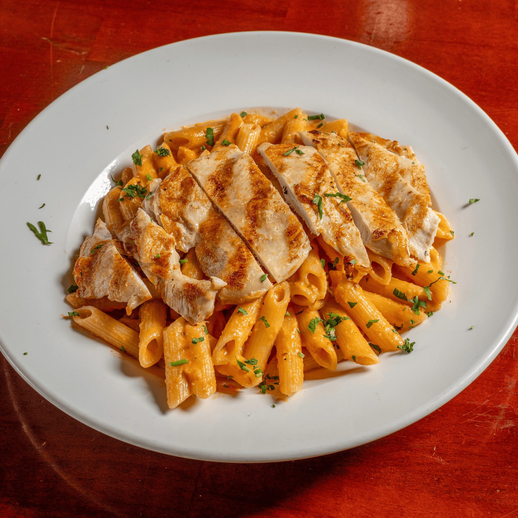 Penne Pasta a La Vodka Con Pollo (Penne Pasta with Vodka Sauce & Chicken).
