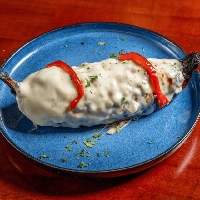 Platano Relleno De Carne Y Queso (Stuffed Plantain with Meat and Cheese).