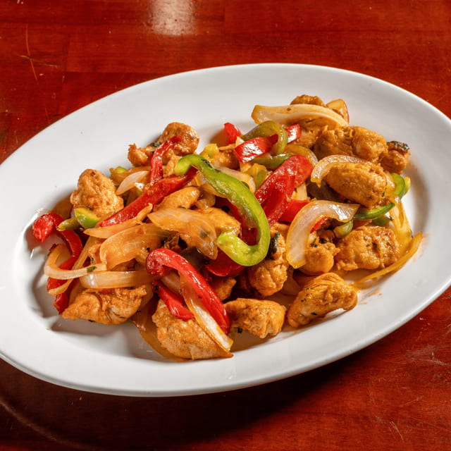 Pollo Salteado (Chicken with Peppers & Onions).