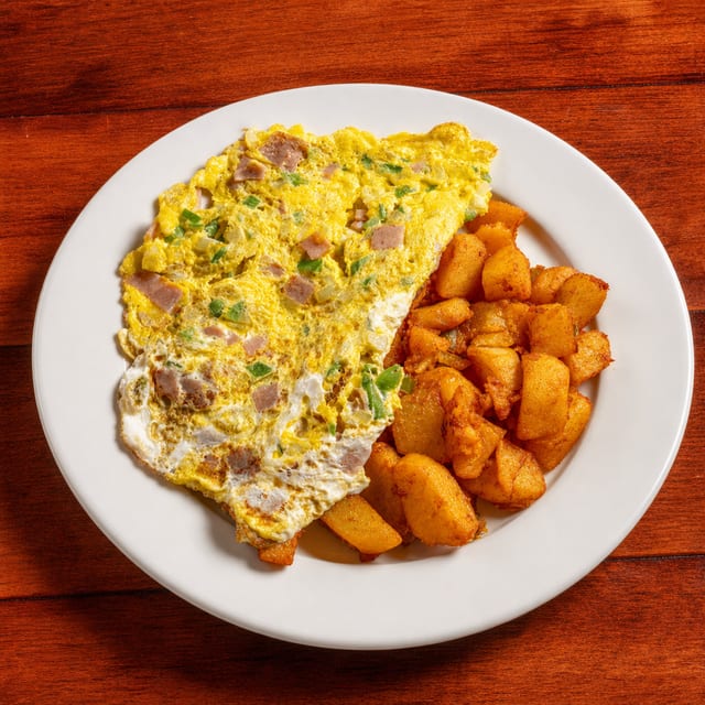 Tortilla Con Pimiento Y Cebolla Combinado 3 Huevos Con Jamón O Chorizo Español O Tocino (Western Omelette 3 Eggs).