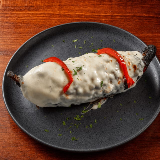 Platano Relleno De Carne Y Queso (Stuffed Plantain with Meat and Cheese).