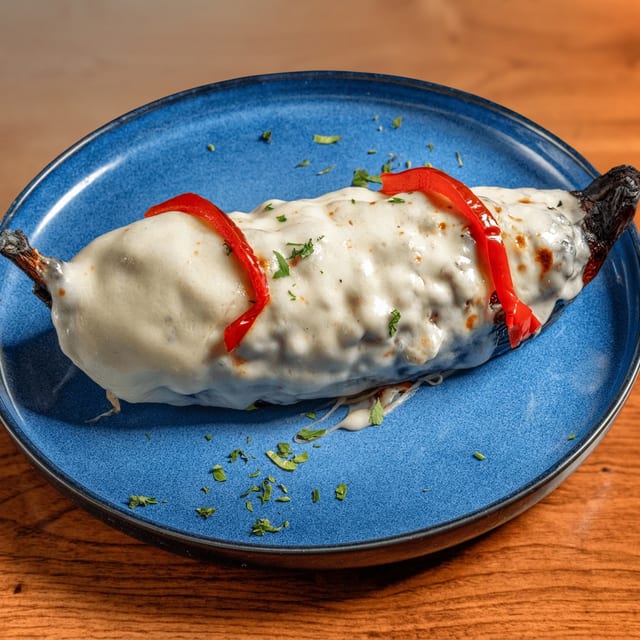 Platano Relleno De Carne Y Queso (Stuffed Plantain with Meat and Cheese).
